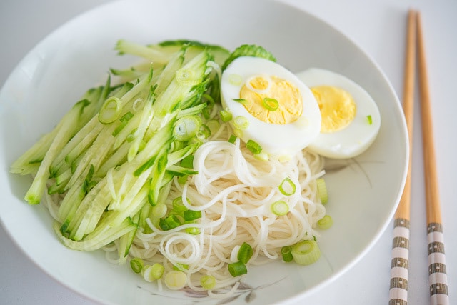 Asian Noodles, Shredded Cucumber, and hard boiled egg in bowl