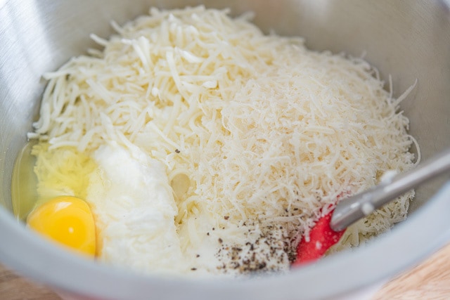 White Lasagna Filling Ingredients in Bowl with Cheeses and Egg