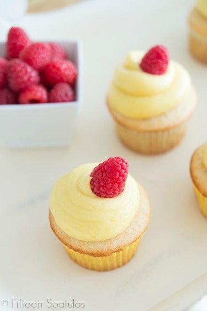French Cupcakes - With Authentic French Vanilla Buttercream On Top and Raspberry Garnish