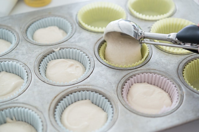 Portioning Cupcake Batter Into Muffin papers with Cookie Scoop