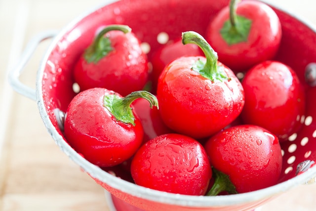 Hot Cherry Peppers in Red Colander