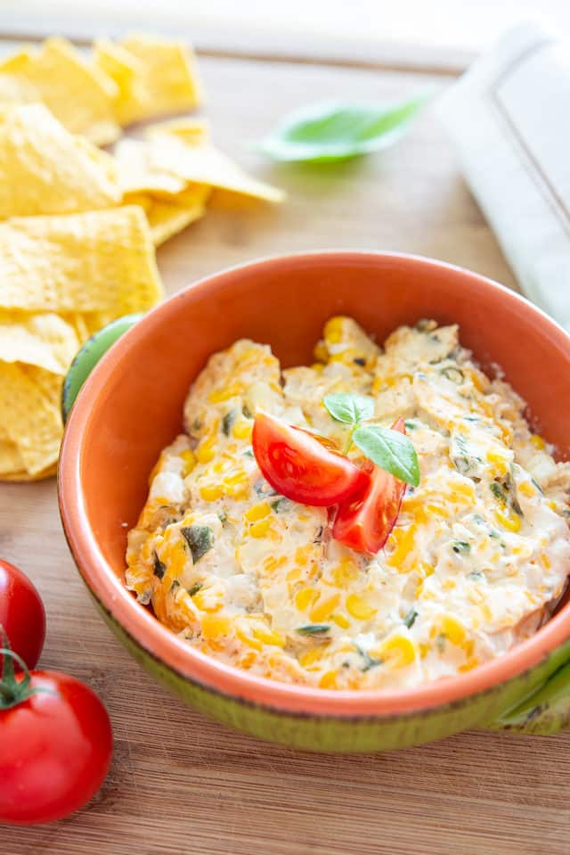 Hot Corn Dip Recipe - Served in Green Bowl with Roasted Poblano Chiles