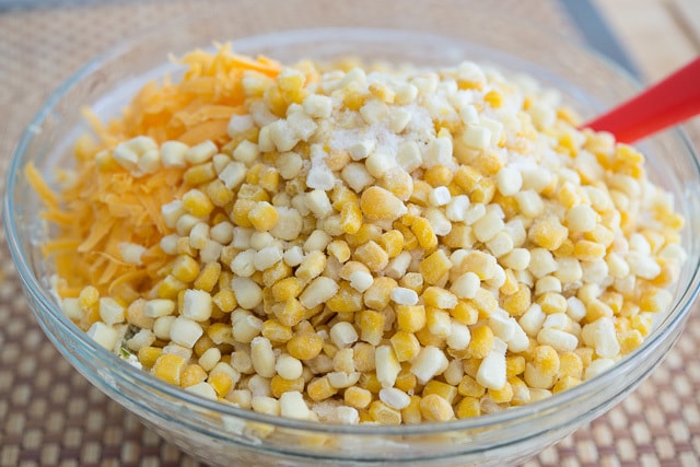 Frozen Corn Kernels and Cheese Added to Bowl 