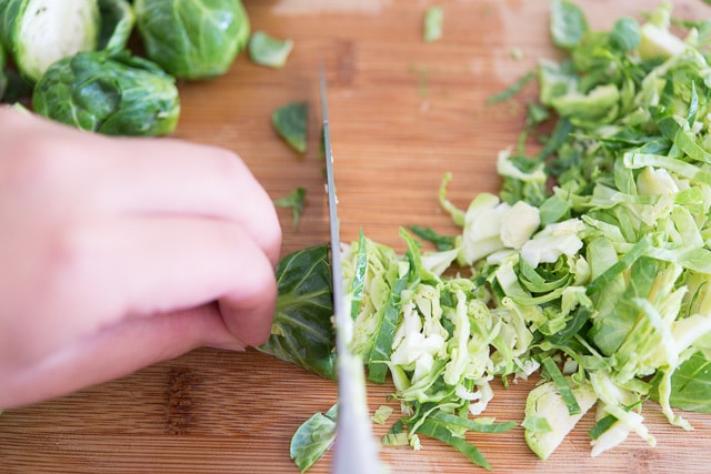 Slicing Brussel Sprout Thinly with a knife