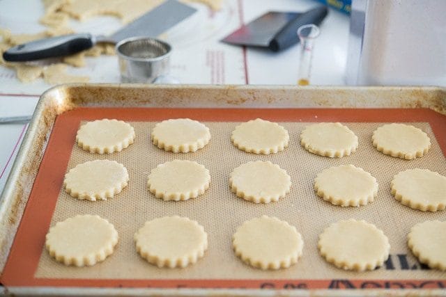 Cut Sugar Cookie Circles on Silicone Mat