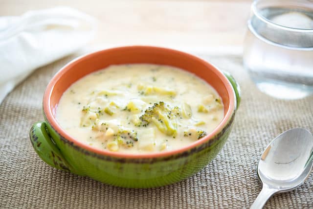 Broccoli Cheddar Soup Recipe - Served in Green Bowl on Placemat