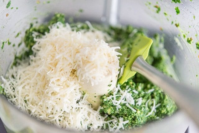 Grated Parmesan Cheese Added to Food Processor Bowl