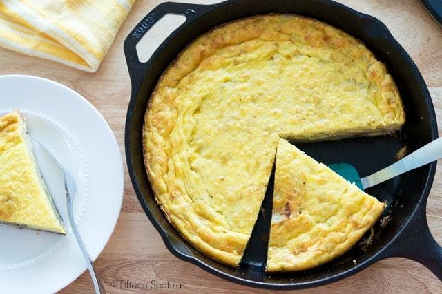 Spanish Frittata - In Cast Iron Skillet Cut Into Wedges