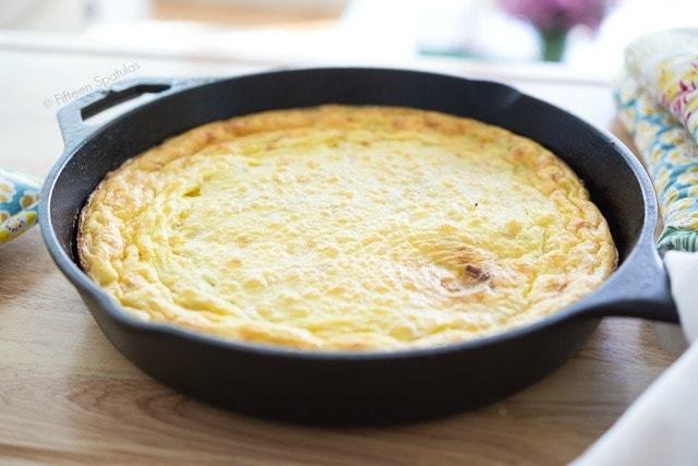 Baked Spanish Tortilla - In Cast Iron on Wooden Surface