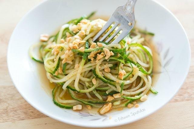 Spiralized Cucumber Salad - in Bowl with Fork Twirling Noodles