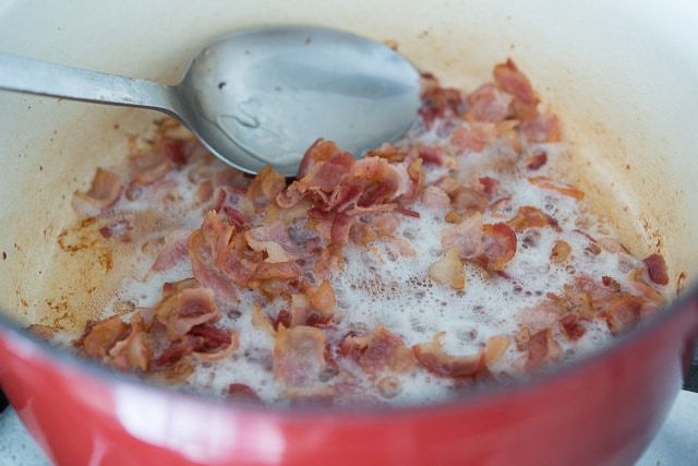 Frying Bacon in Red Dutch Oven