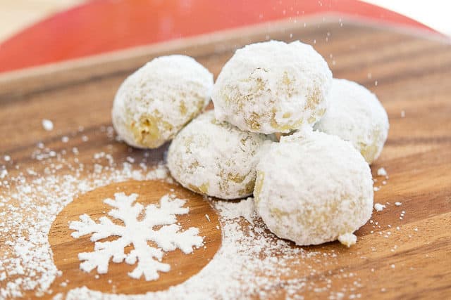 Nut Ball Cookies on Wooden Board with Powdered Sugar