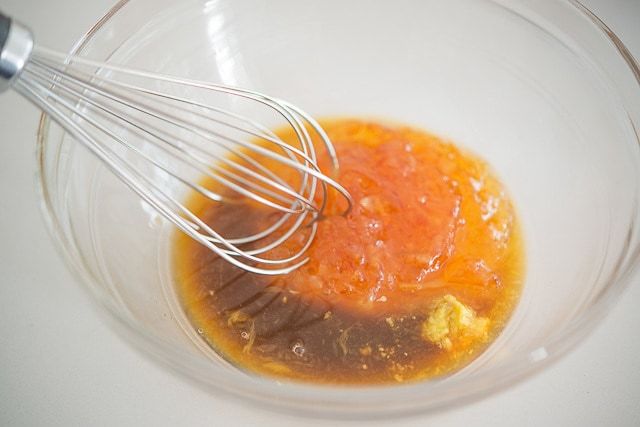 Orange Marmalade and Glaze Ingredients in Bowl with Whisk