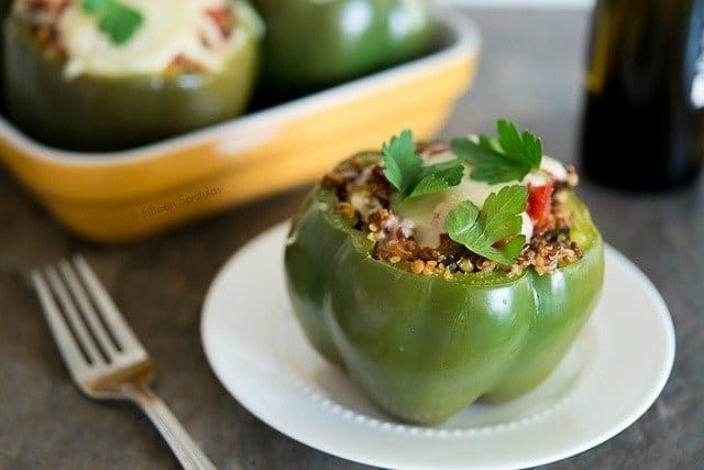 Eggplant Stuffed Peppers - With One on Plate and One in Baking Dish