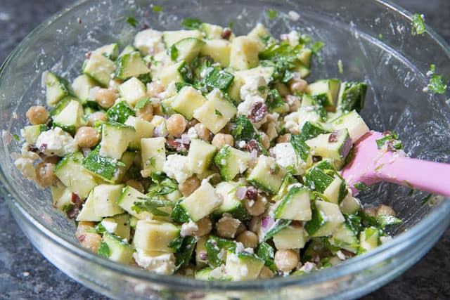 Raw Zucchini Salad with Kalamata Olives, Feta, Chickpeas in Glass Bowl