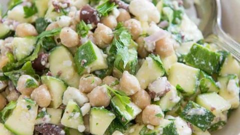 Zucchini Salad - With Raw Zucchini Chunks, Chickpeas, and Olives in Bowl