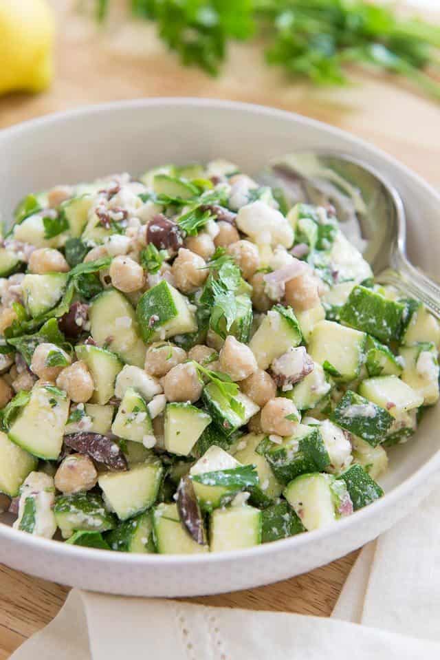 Zucchini Salad - With Raw Zucchini Chunks, Chickpeas, and Olives in Bowl 