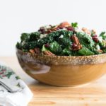 Kale Salad in Mixing Bowl With Pecans, Cranberries, and Feta