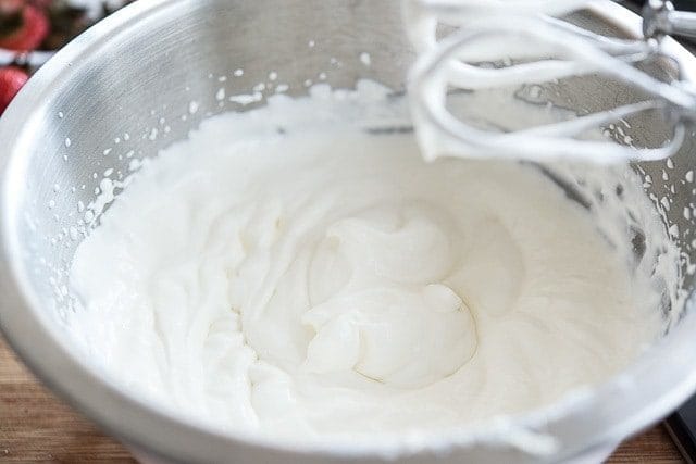 Whipped Cream in Mixing Bowl with Beaters