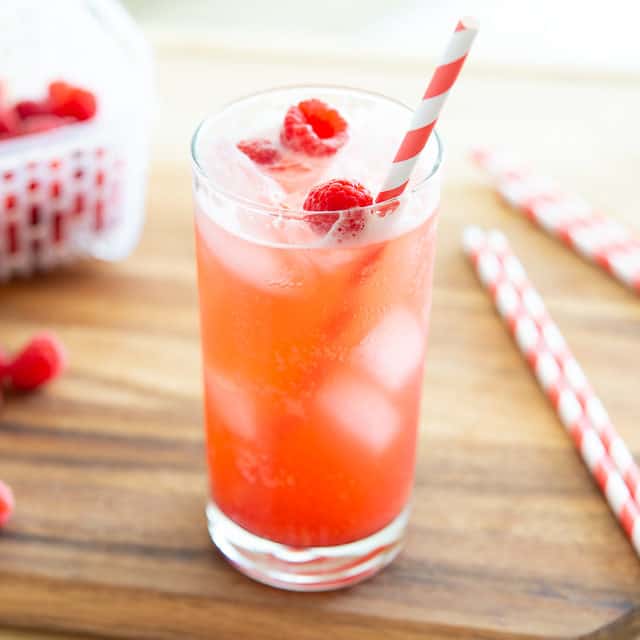 Raspberry Vanilla Soda in a glass with straw