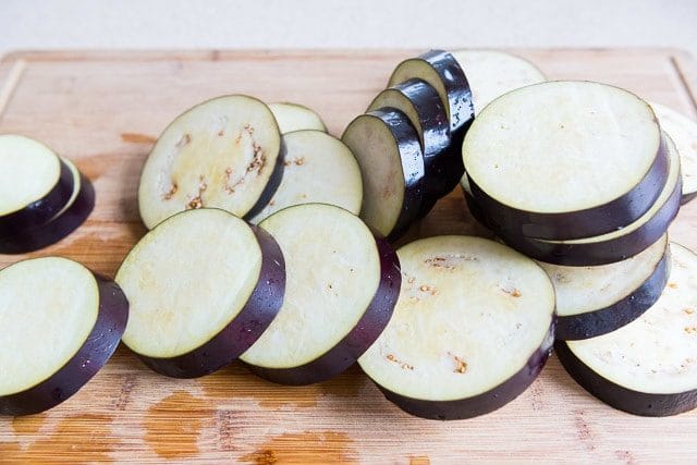 Slices of Eggplant on Wooden Board