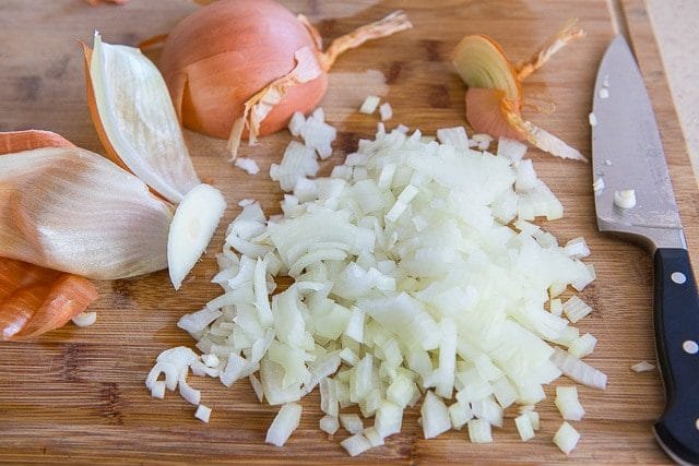 Chopped Yellow Onions on Wooden Board