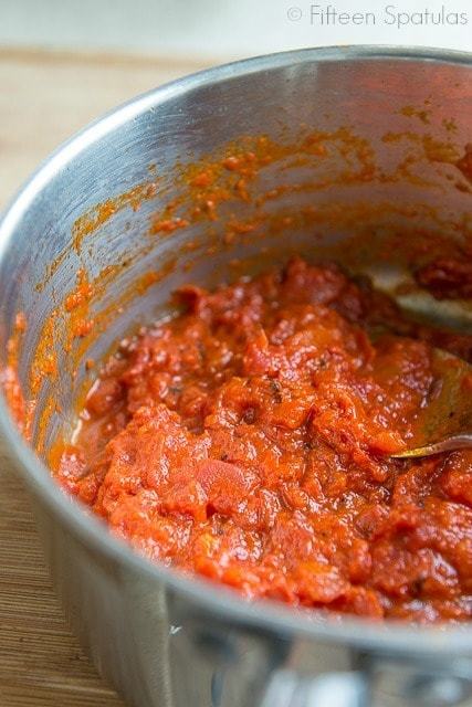 Homemade Tomato Sauce in a Saucepan with Spoon