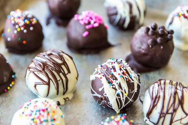 Oreo Truffles - Presented on a Tray with Colorful Sprinkles and Chocolate Drizzle is one of the most fun desserts to make