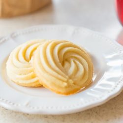 Two Butter Cookies on A Plate with Swirl Shape