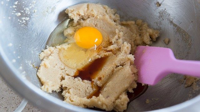 Creamed Butter and Sugar in Bowl with Egg and Vanilla Added
