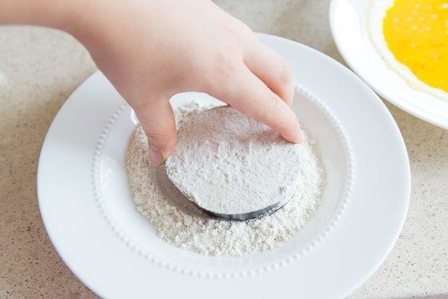 Dipping Eggplant Slice In Flour
