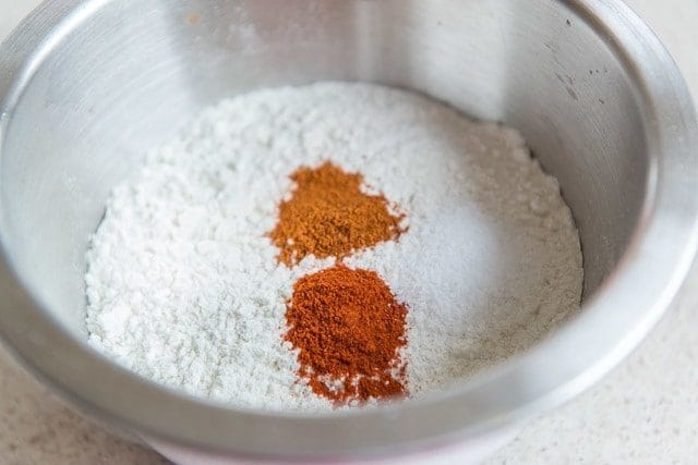 Flour, Spices, and Salt in Stainless Steel Mixing Bowl