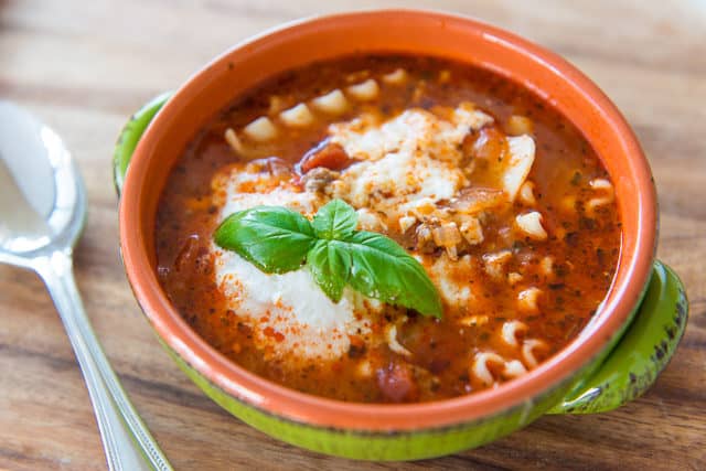 Lasagna Soup Recipe - Served in Green Bowl With Ricotta Cheese and Fresh Basil