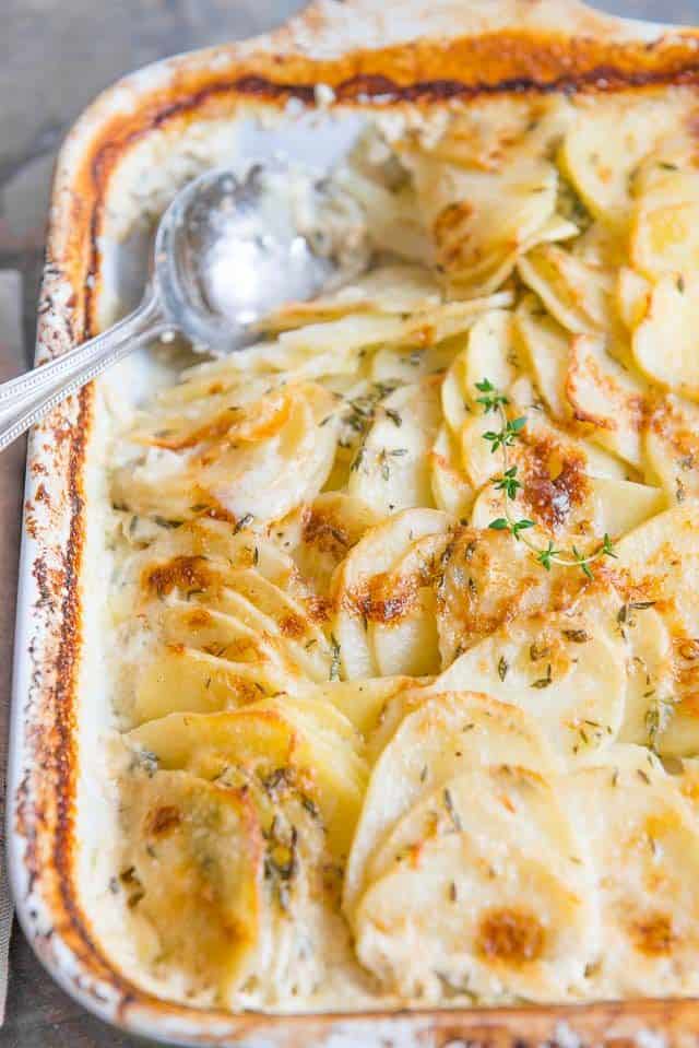 Potato Gratin - In Casserole Dish with Spoon