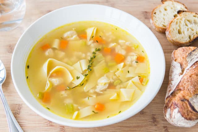 Quick Chicken Soup - In a White Bowl with Pappardelle and Thyme Sprigs