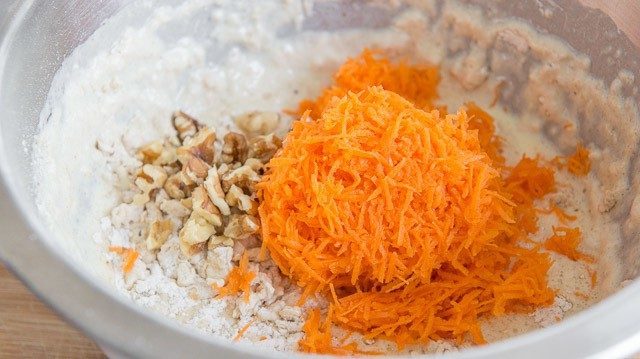 Grated Carrots and Walnuts Added to Carrot Cake Pancake Batter