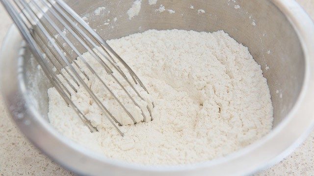 Flour and Leavening in Bowl with Whisk