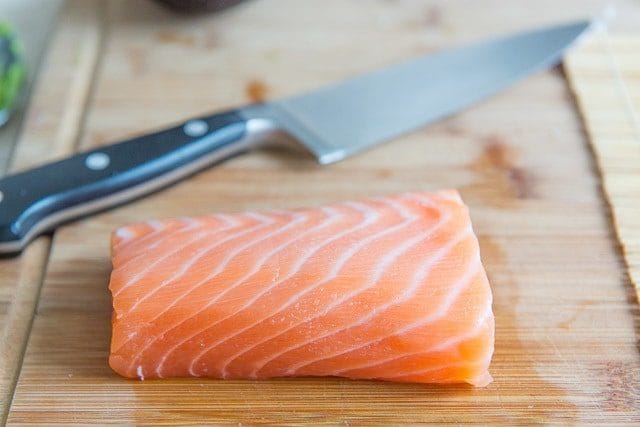 Sashimi Grade Salmon Piece on Wooden Board