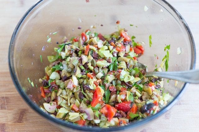Muffuletta Salad Ingredients in Glass Bowl