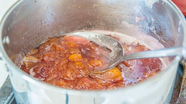 Fresh peach simple syrup - in saucepan for sparkling iced tea