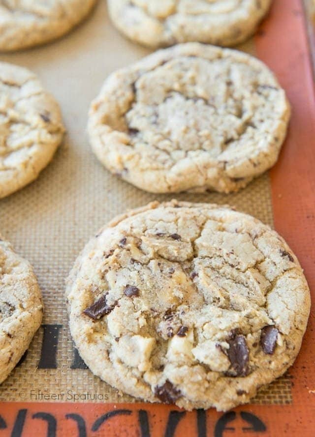 White & Dark Chocolate Chunk Cookies on a Silicone Mat