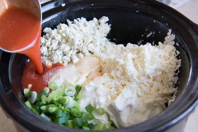 Cream Cheese, Green Onion, Blue Cheese, Buffalo Sauce in Crock Pot