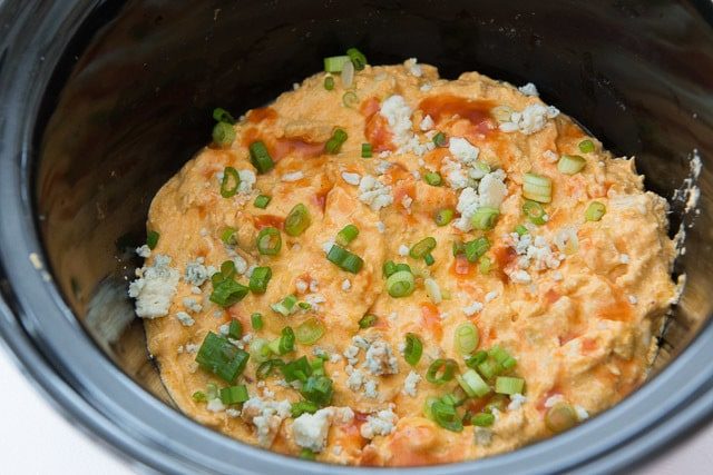 Cooked Crock Pot Chicken Dip with Buffalo Sauce Drizzle