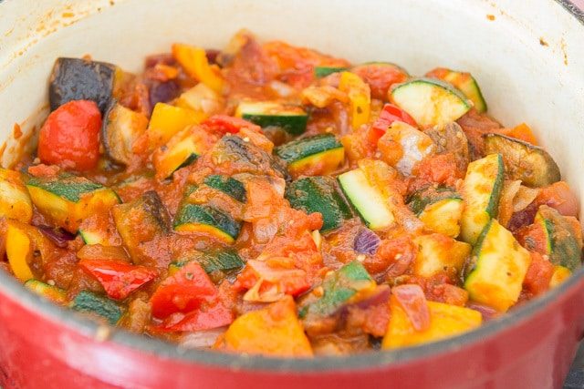 Ratatouille Food - Fresh Vegetables and Tomato Sauce in Red Dutch Oven