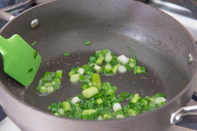 Green Onion and Oil Frying in Nonstick Skillet