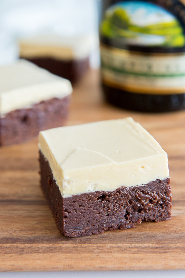 Irish Cream Brownies on Cutting Board with Caramelized White Chocolate Buttercream