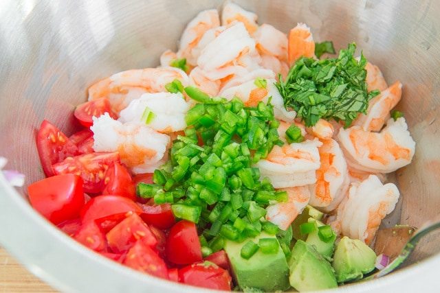 Shrimp, Avocado, Jalapeno, Herbs, and Tomatoes in Mixing Bowl
