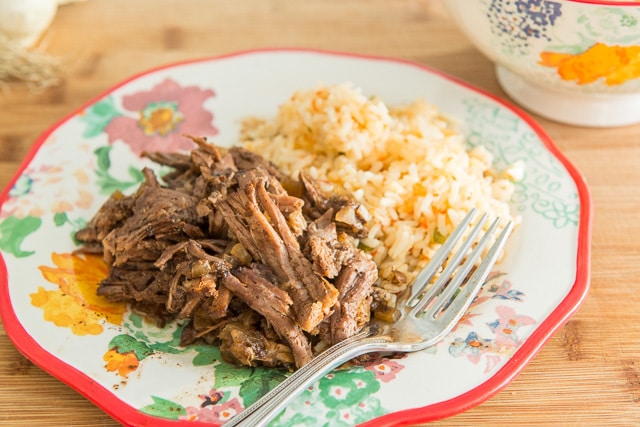 Shredded Mexican Beef on Plate with Rice and Fork