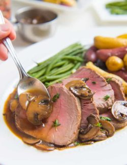 Beef Tenderloin - Sliced and Served with Mushroom Pan Sauce Spooned On
