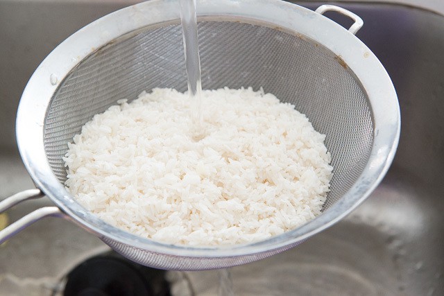 Rinsing Rice in running Water